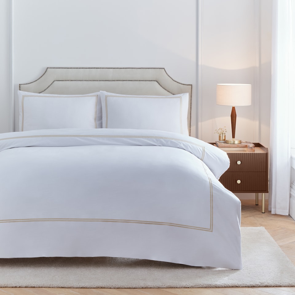 image 1 of Paoletti Elara Embroidered 100% Cotton Duvet Cover Set | Cream | Champagne | Super King