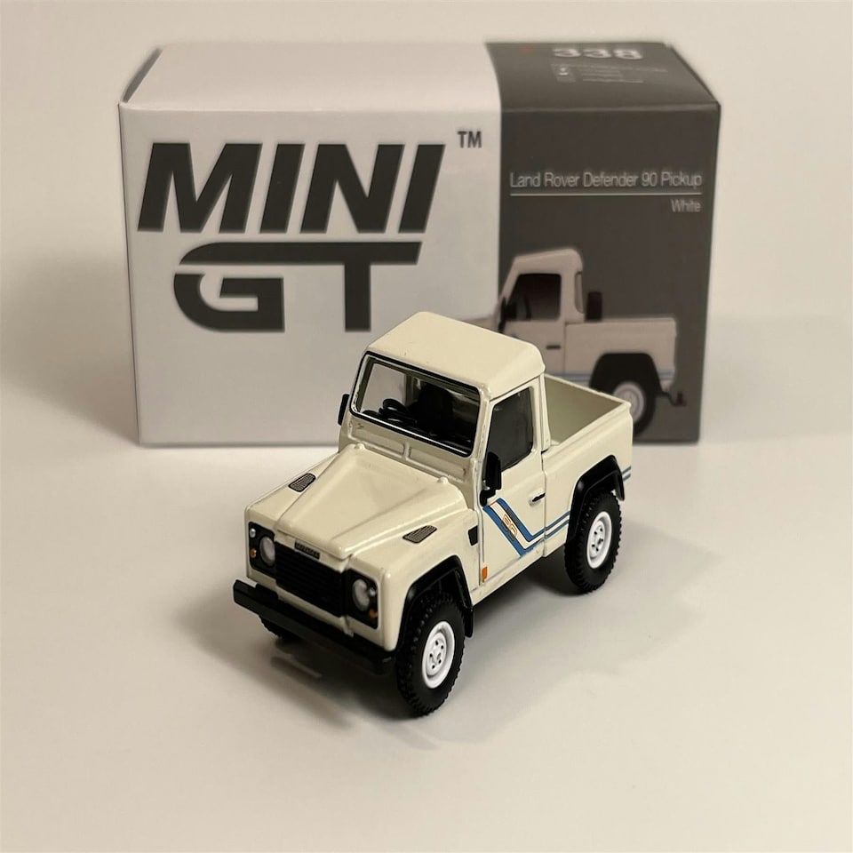image 1 of Land Rover Defender 90 Pick Up White 1:64 Scale Mini GT MGT00338R
