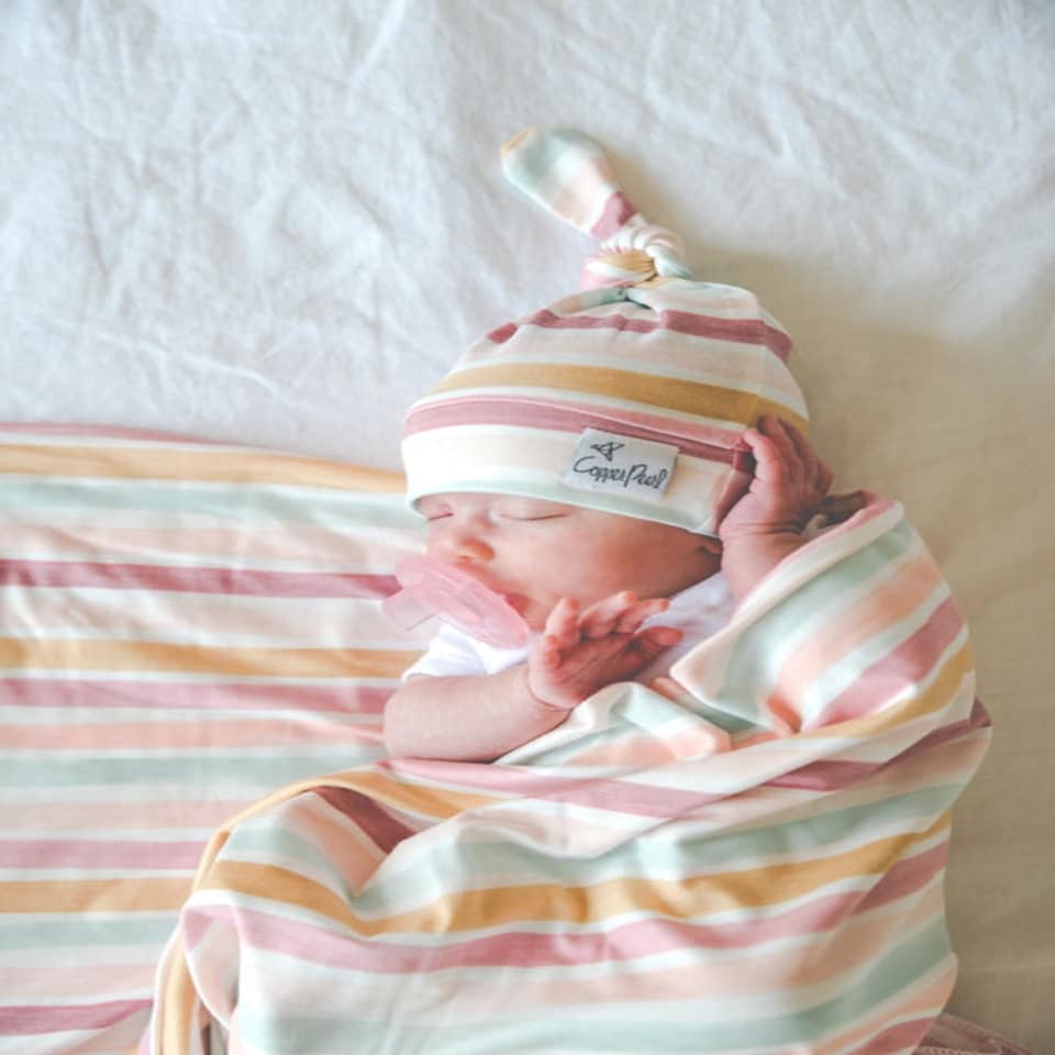 image 1 of Copper Pearl Knitted Swaddle Blanket Enchanted