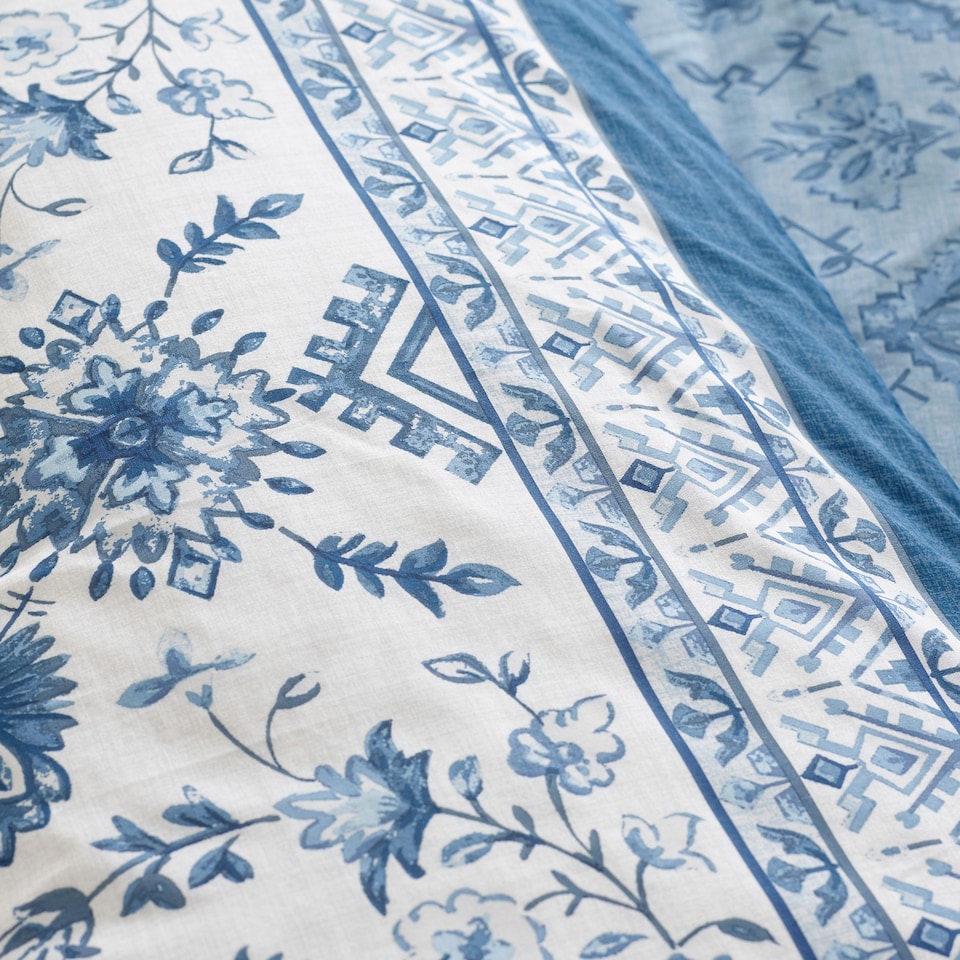 image 1 of Catherine Lansfield Zoukara Floral Reversible Duvet Cover Set | Blue | Double
