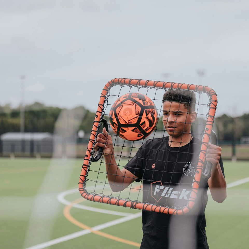 image 1 of Football Flick  Handheld Football Rebounder