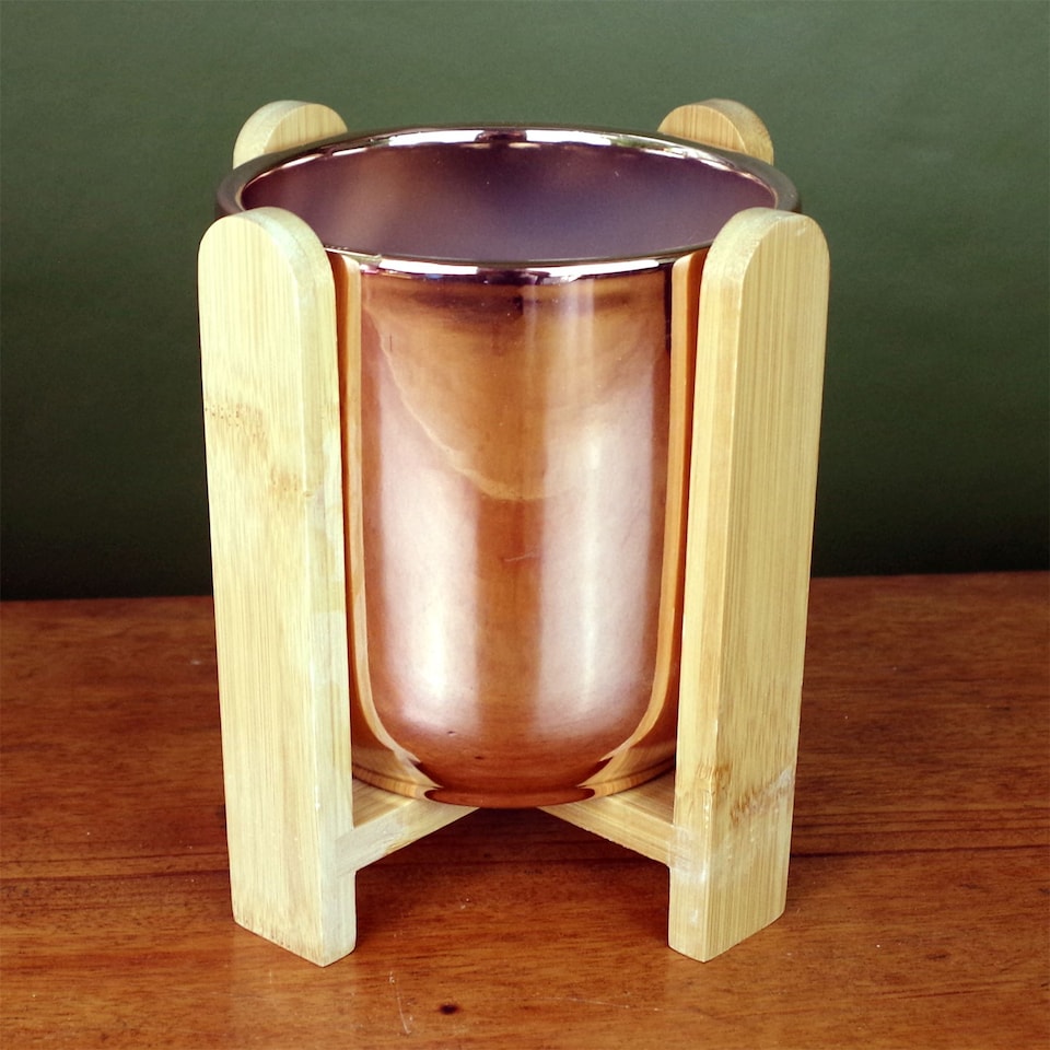 image 1 of Gold Ceramic Planter Bamboo Stand Plant Pot | Gold