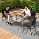 image 8 of Outsunny Outdoor 4 Pieces Patio Furniture Set with Breathable Mesh Fabric Seat & Backrest, Garden Set with Two Foldable Armchairs, a Loveseat & Glass Top Table, Black
