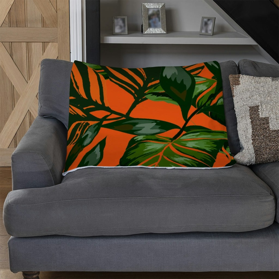 image 1 of Green Tropical Leaves on Orange (Blanket)