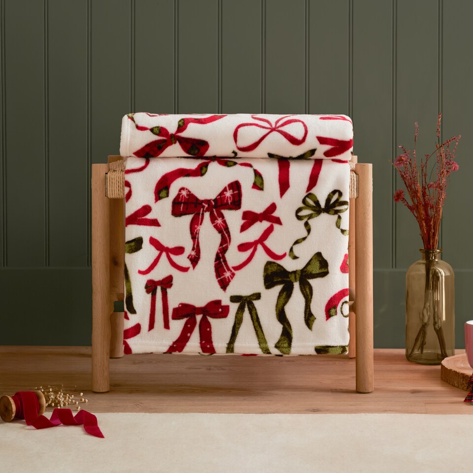 image 1 of Furn Festive Bows Printed Fleece Throw | Red | Berry/Pine | 1