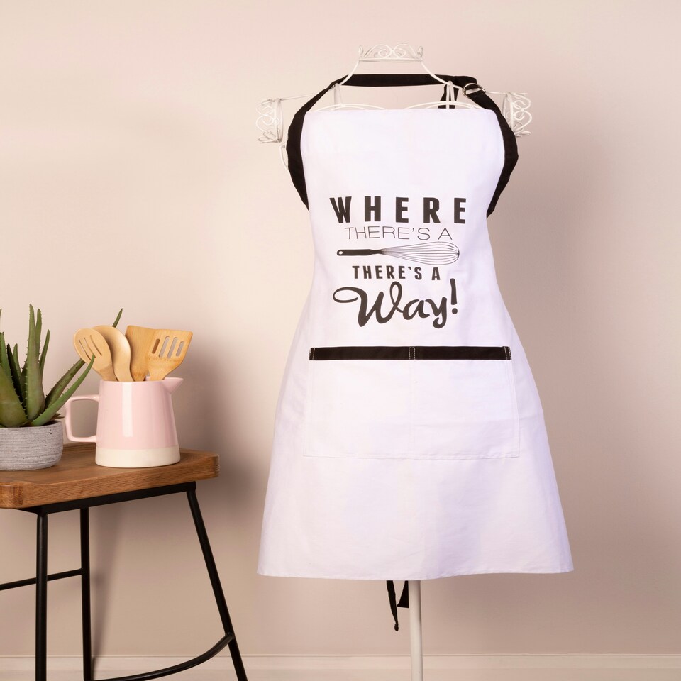 image 1 of Interiors by Premier Apron, Playful Typography Print With Adjustable Neck And Waist Straps, Shields Clothing During Cooking White