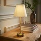 image 1 of ValueLights Lowe Brushed Gold Table Lamp with Natural Tapered Shade and Globe LED 2W Cool White 2700K Bulb