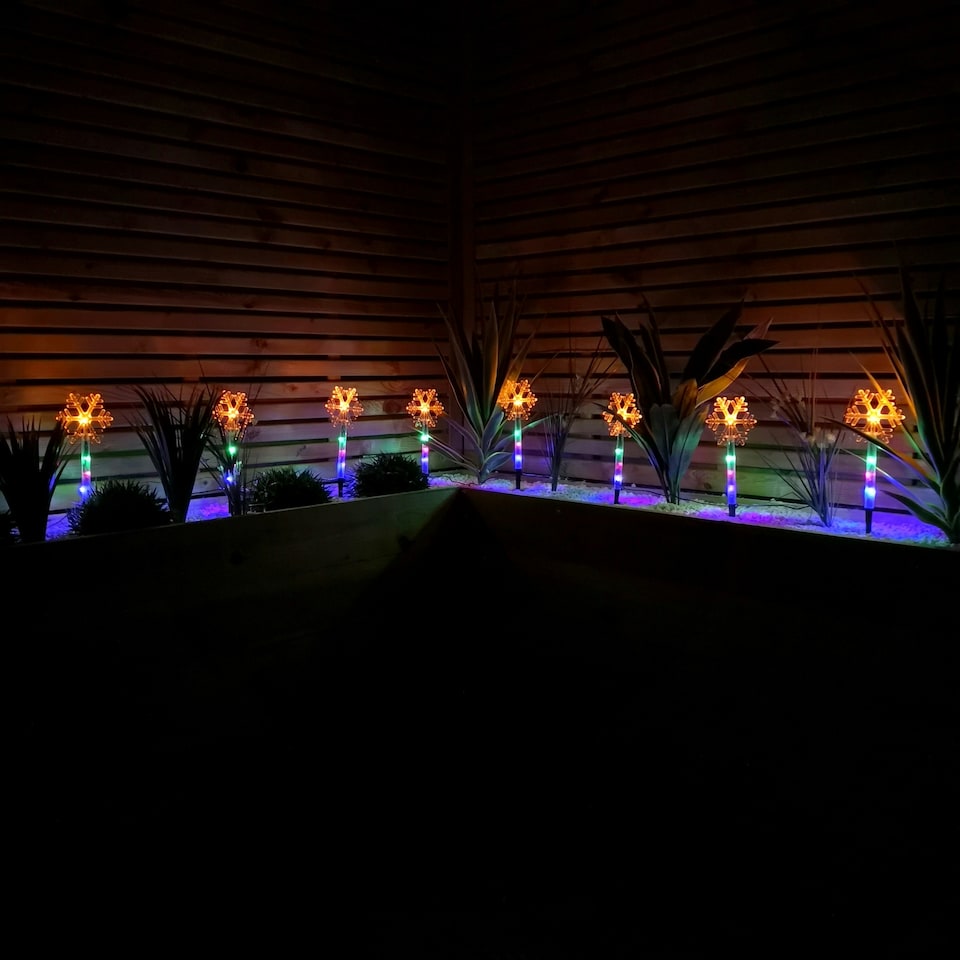 image 1 of Set of 8 Battery Operated LED Multi Coloured Snowflake Path Lights Christmas Decoration with Timer
