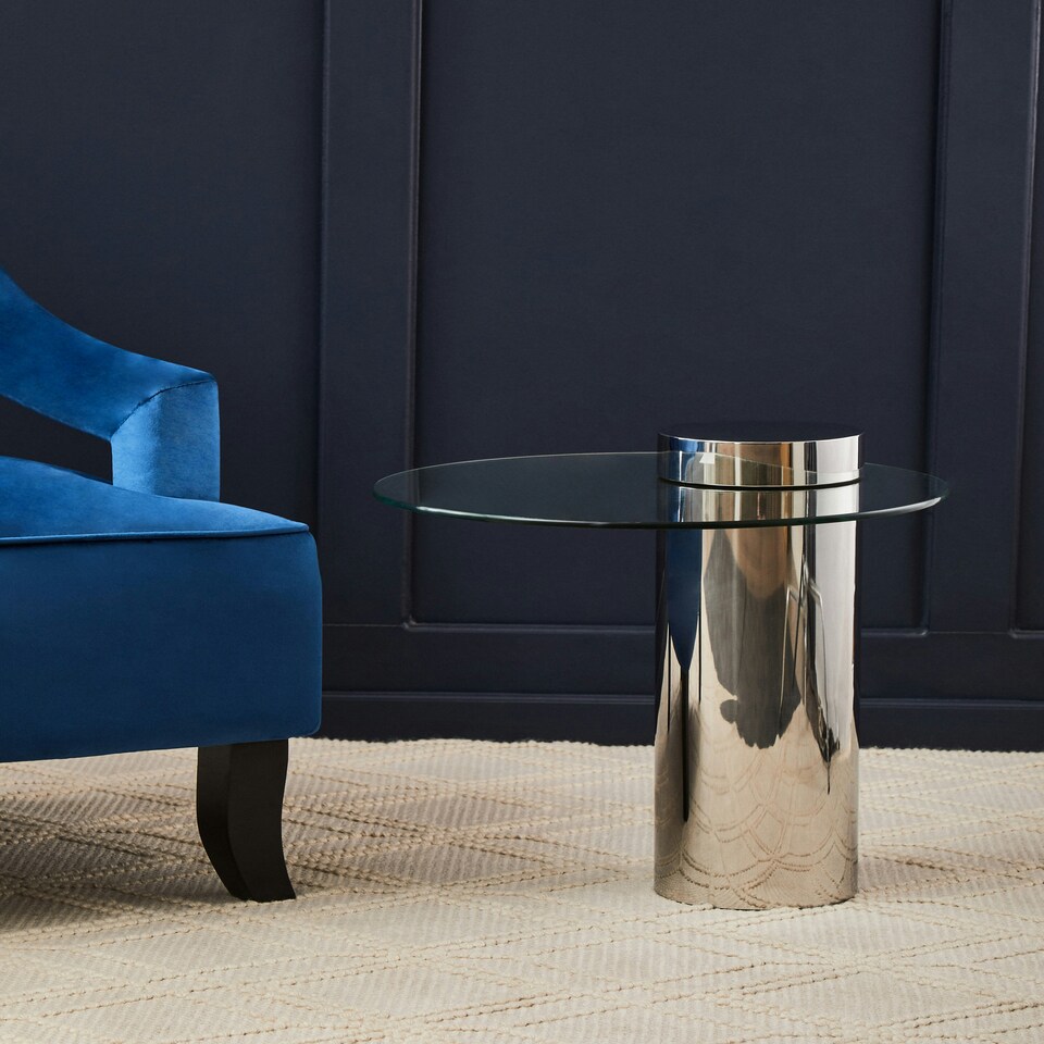 image 1 of Interiors by Premier Clear Glass Side Table with Silver Base, Round Tempered Glass C‑Shape Accent Table, Steel Silver‑Finish Silver