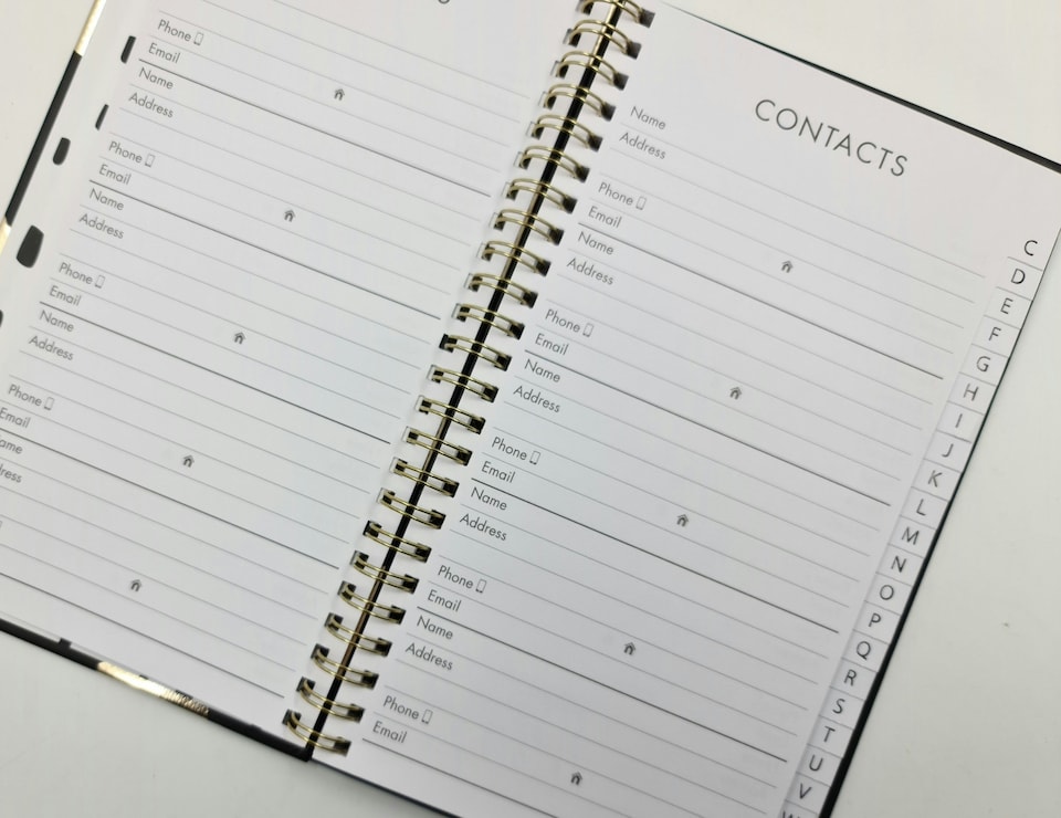 image 1 of Slim Spiral Bound Marble Address Book