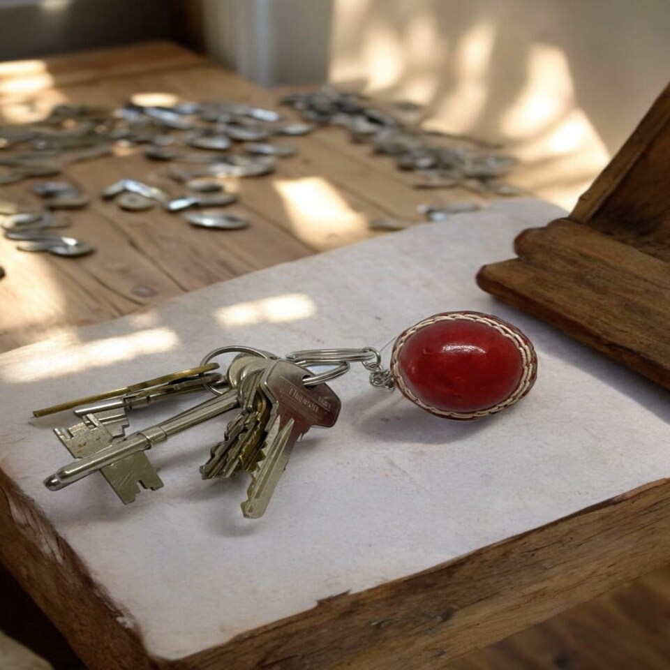 image 1 of CRICKET-GIFTS - Mini Cricket Ball Keyring | Real Leather | 4cm Diameter | Cricket Themed for Men | Handmade in UK | Ideal for Cricket Fans, Red, Leather Red