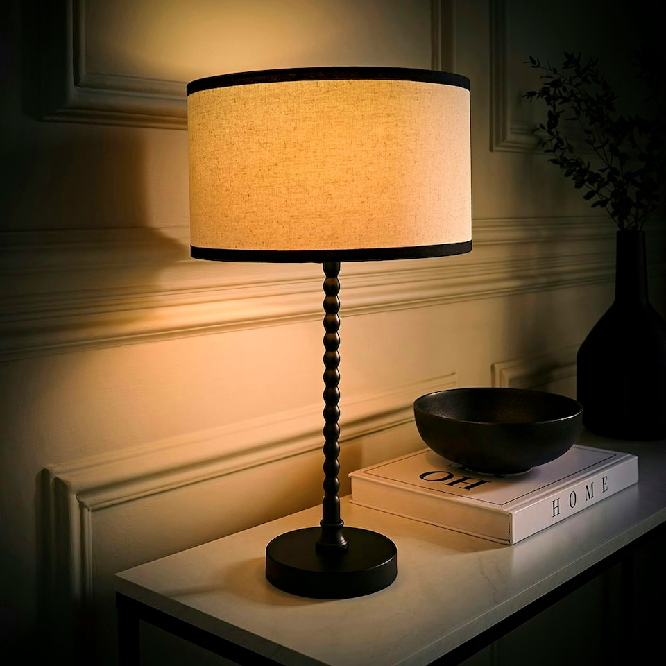 image 1 of ValueLights Maeve Natural Linen Black Trim Drum Shade Matte Black Bobbin Table Lamp and Bulb | Black