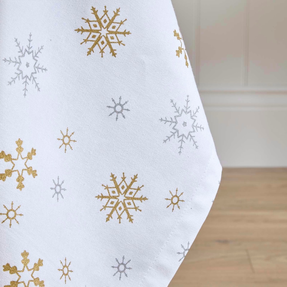 image 1 of Homescapes Gold Snowflake Christmas Tablecloth - 137 x 137 cm | White | 137cm x 137cm (54" x 54")