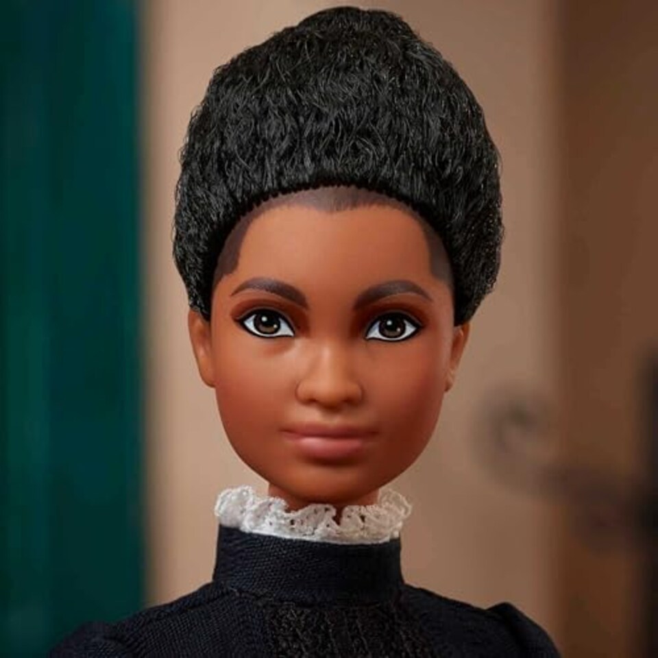 image 1 of Barbie Inspiring Women Doll, Ida B. Wells Collectible with Blue Dress Newspaper