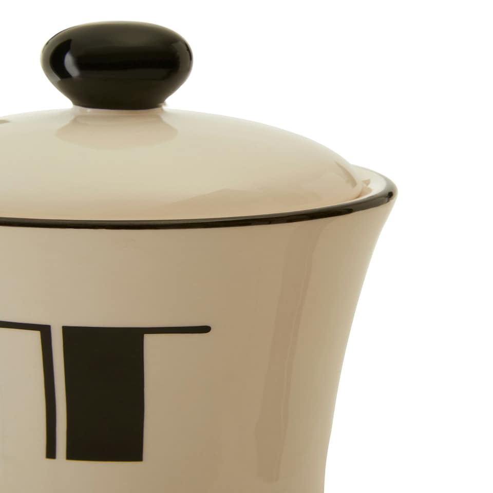 image 1 of Interiors By Premier Luxe Cream Finish Tea Canister,Dolomite Kitchen Storage Container With Black Trim,Art Deco Tea Canisters