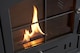 image 10 of OKO S2 Bio Ethanol Stove with Log Storage in Charcoal Grey with Angled Stove Pipe