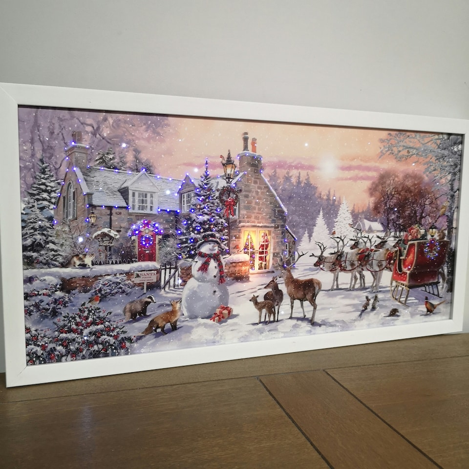 image 1 of 60 x 30cm Battery Operated Fibre Optic Touch Activated LED Christmas Wall Art with Santa Cottage Scene