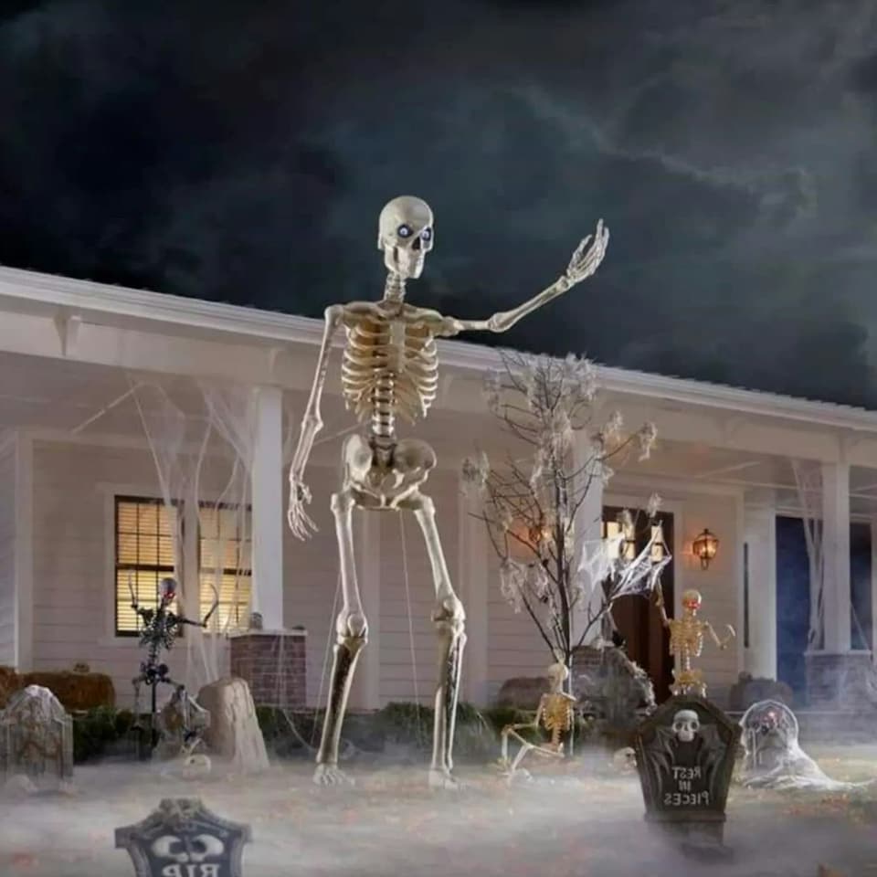 image 1 of Home Accents Holiday 12ft Standing Giant Halloween Skeleton with LCD Eyes and Posable Arms