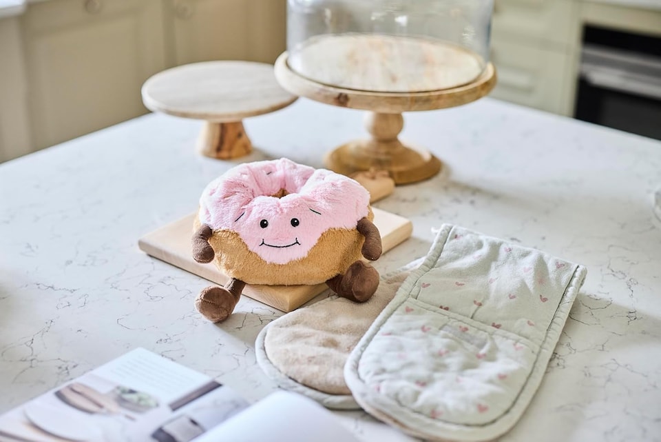 image 1 of Warmies Microwaveable Pink Donut Soft Plush Cuddly, Weighted Teddy Lavender Scented for Soothing Warmth & Pain Relief, Hot or Cold Use