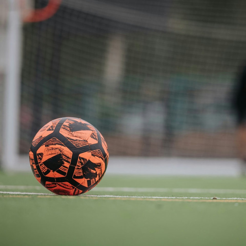 image 1 of Football Flick Size 4 Football – Training and Match Ball – Highly Durable with Shape Retention - Unique Orange and Black Design