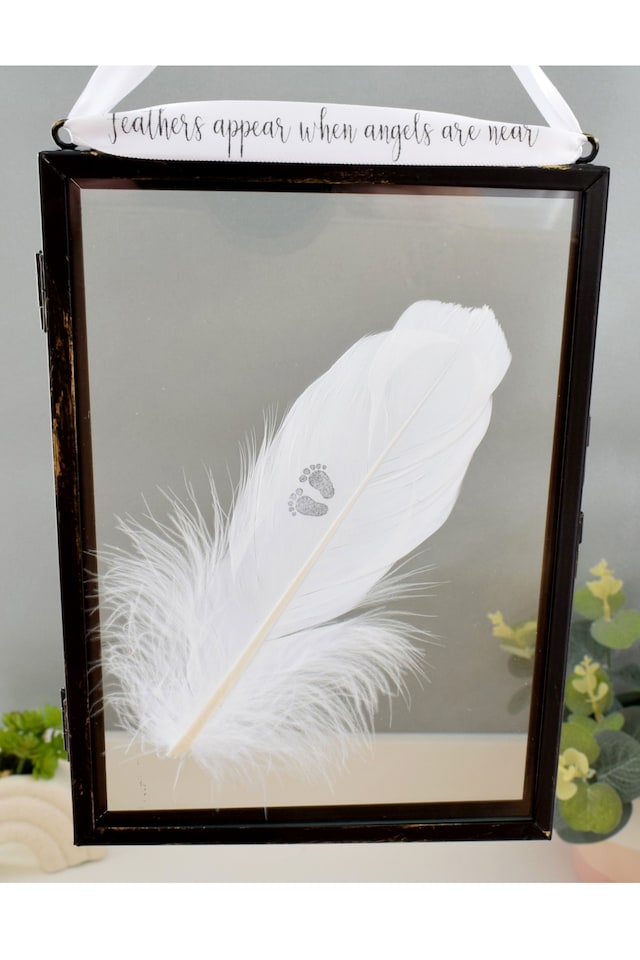 image 1 of In Memory of Baby. Baby Feet Real feather Floating Picture Frame