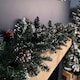 image 7 of 2.7m Green Christmas Garland with Pine Cones and Red Berries