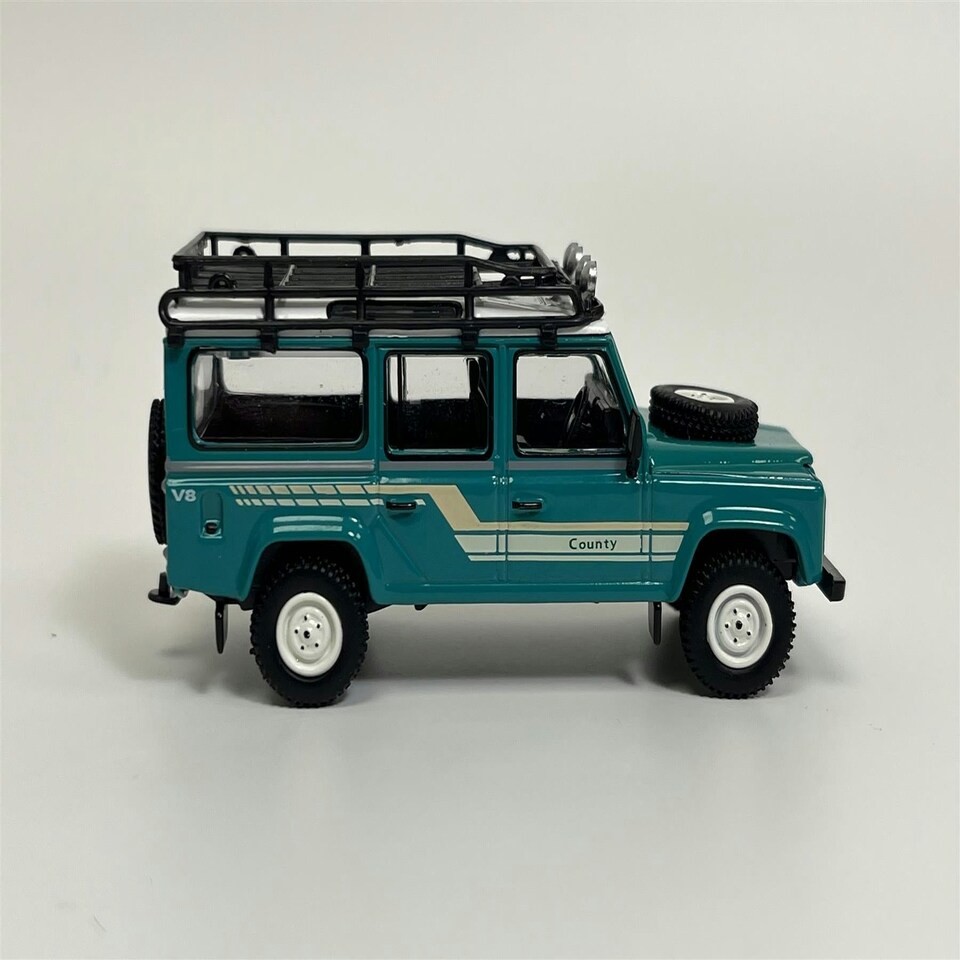 image 1 of Land Rover Defender 110 1985 County Station Wagon Green RHD 1:64 Mini GT MGT00590R