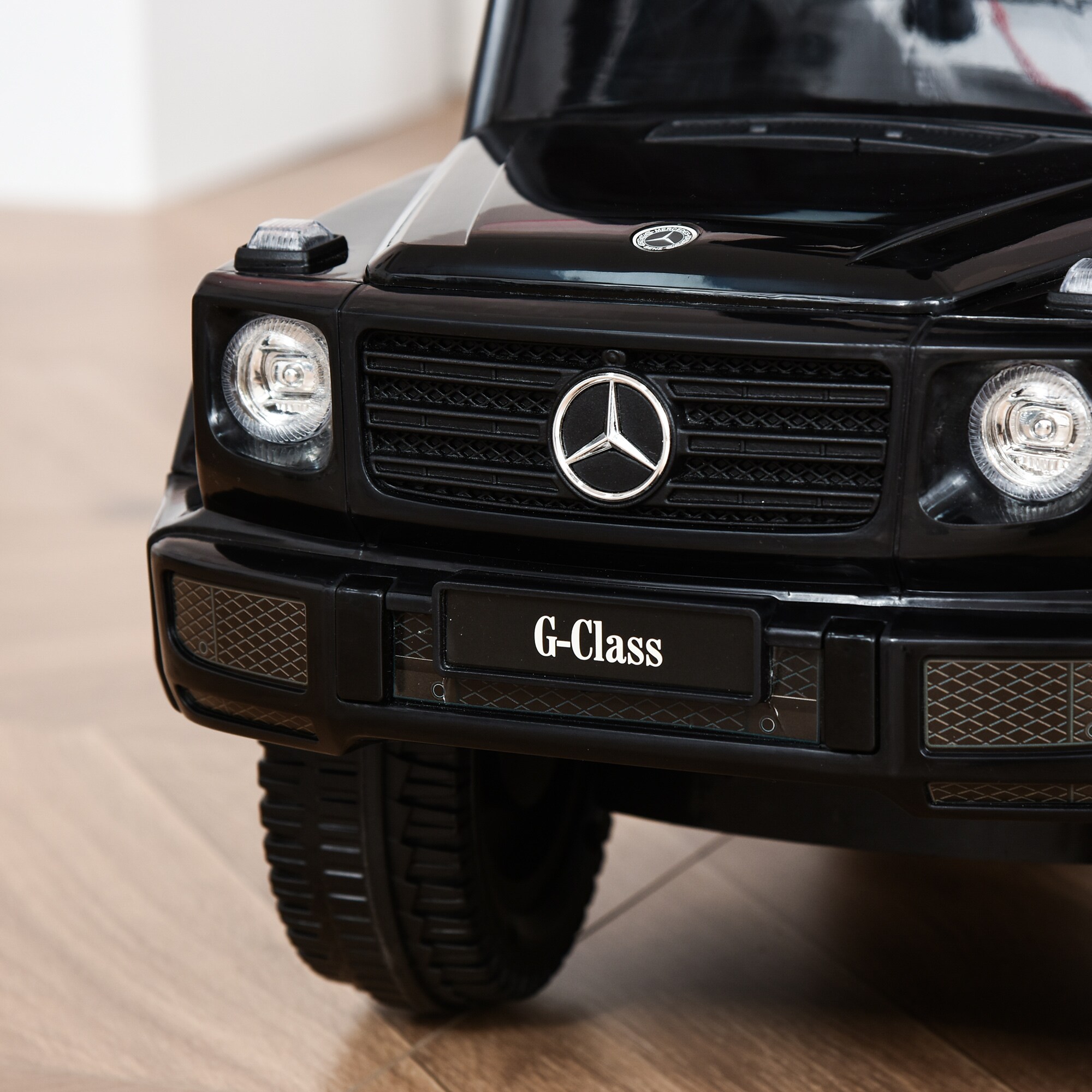 Best Ride On Cars Kids Outdoor Stroller Mercedes G-Wagon Push Car with Working Lights, Horn, and Music for Ages 1 to 3 years, Pink