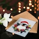 image 4 of Cute Baby Penguin With Santa Hat in Holly Wreath Blank For Him Or Her Art Christmas Card