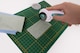 image 6 of Milward 45mm Rotary Cutter with 5 Blades - Ergonomic, Safety Lock, Left/Right-Handed, Aqua & White