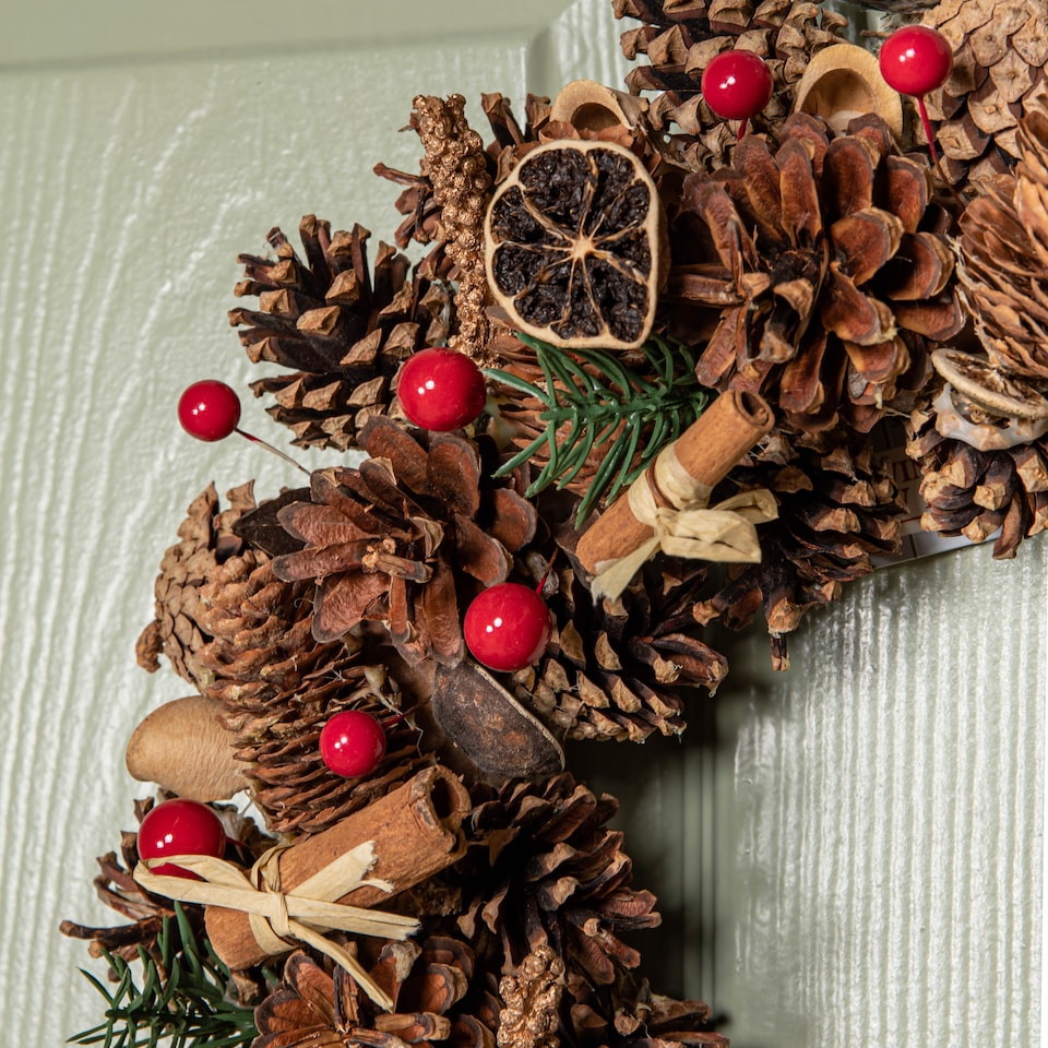 image 1 of 36cm Winter Spice Hanging Christmas Wreath with Pine Cones Red Berries & Dried Fruit