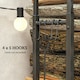 image 5 of Outsunny 100-150cm Retractable Metal Firewood Log Holder Rack with Hooks