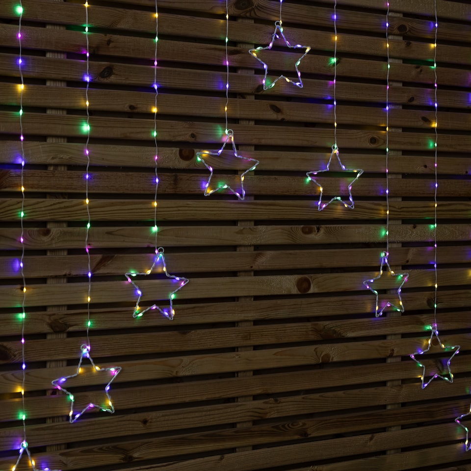 image 1 of 1.2m Multi Colour LED Star Curtain Lights Christmas Decorations
