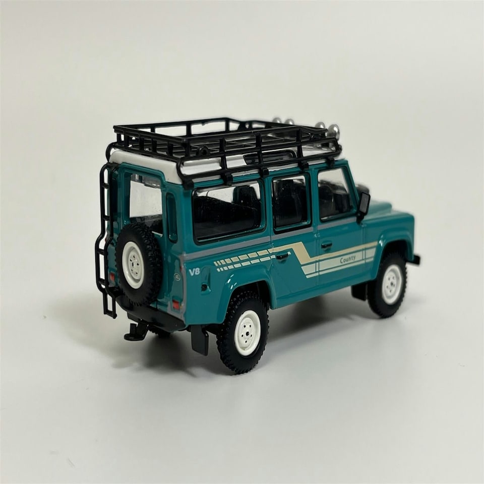 image 1 of Land Rover Defender 110 1985 County Station Wagon Green RHD 1:64 Mini GT MGT00590R