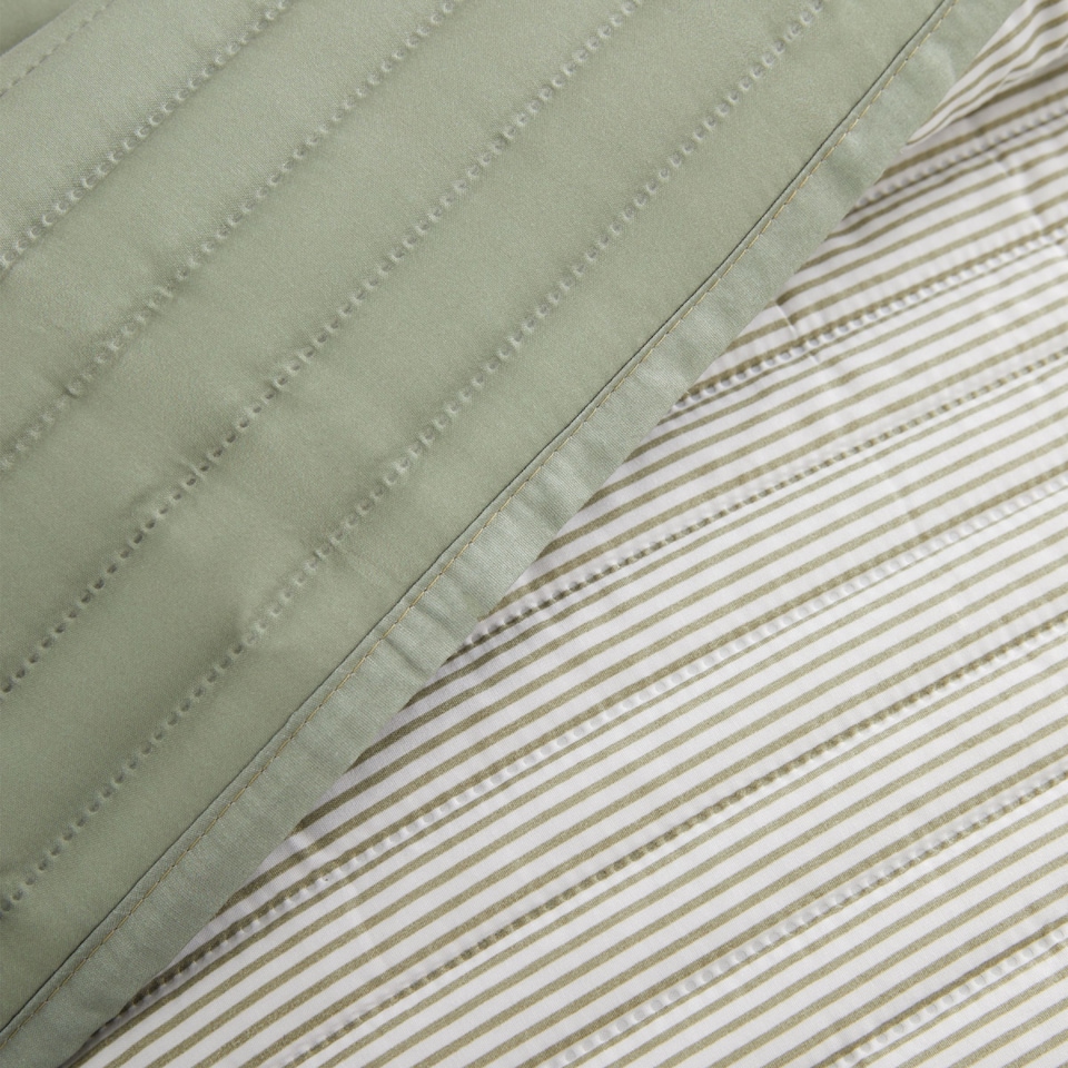 image 1 of Catherine Lansfield Stripe Quilted Reversible Bedspread | Green | One Size
