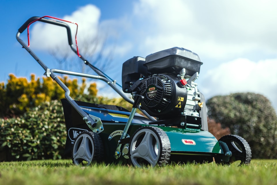 image 1 of Webb WEPS400 4 Wheel Petrol Lawn Scarifier & Raker with 40cm Working Width, 8 Depths and 45L Collection Bag - 3 Year Guarantee