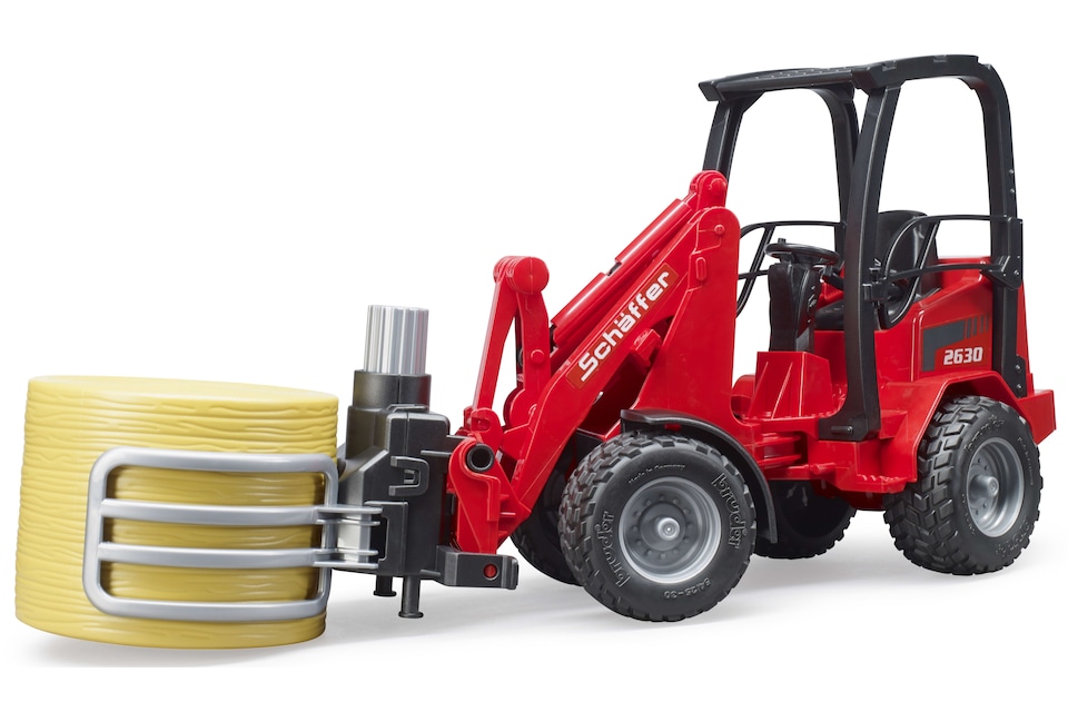 image 1 of Bruder Sch ffer Compact loader 2630 with bale gripper 1 round bale Construction Loader Model