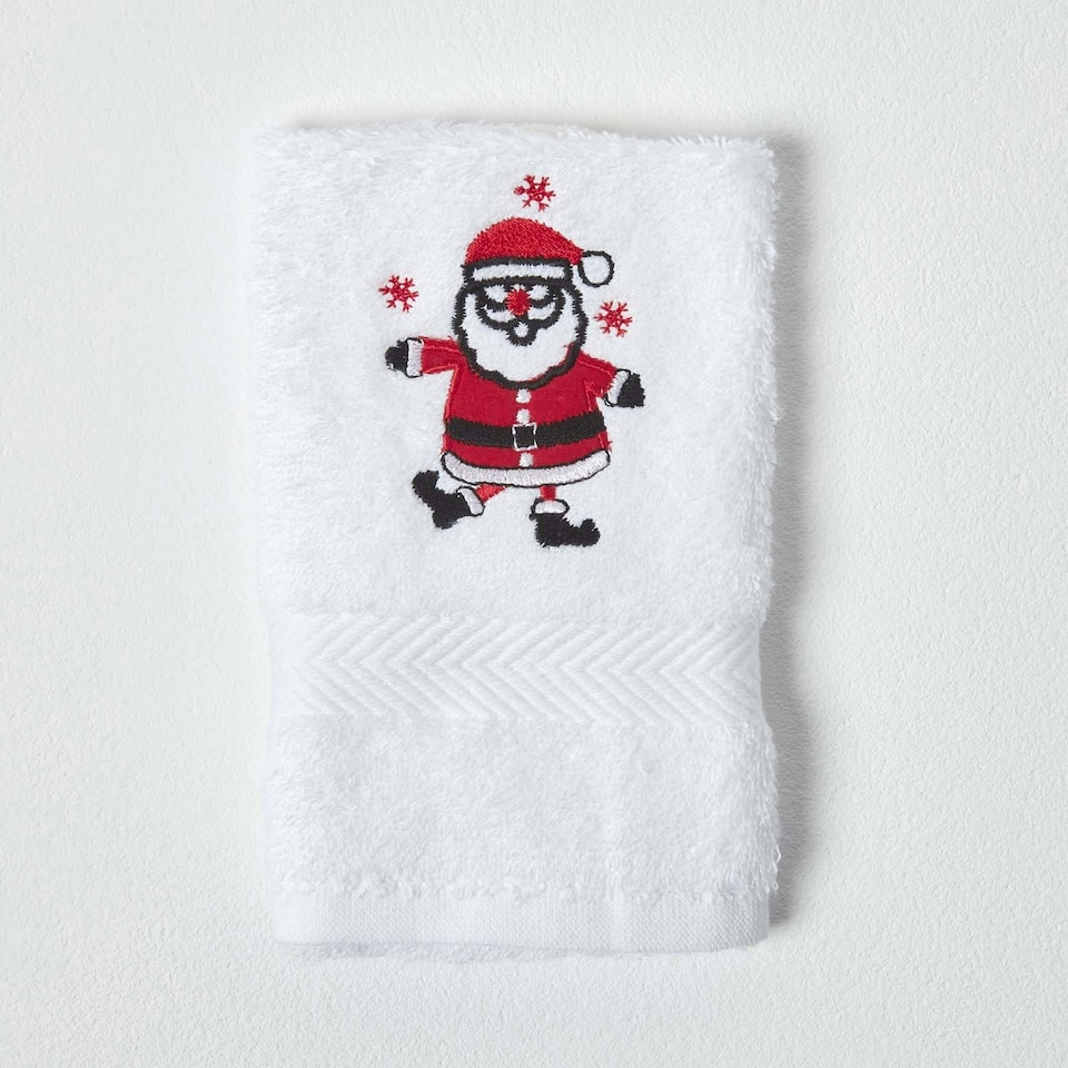 image 1 of Homescapes Santa Embroidered Cotton Small Christmas Towel | White | Hand towel
