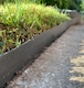 image 3 of Flexible Black Plastic Garden Lawn Edging with 40 Pegs (10m) - 4 Rolls