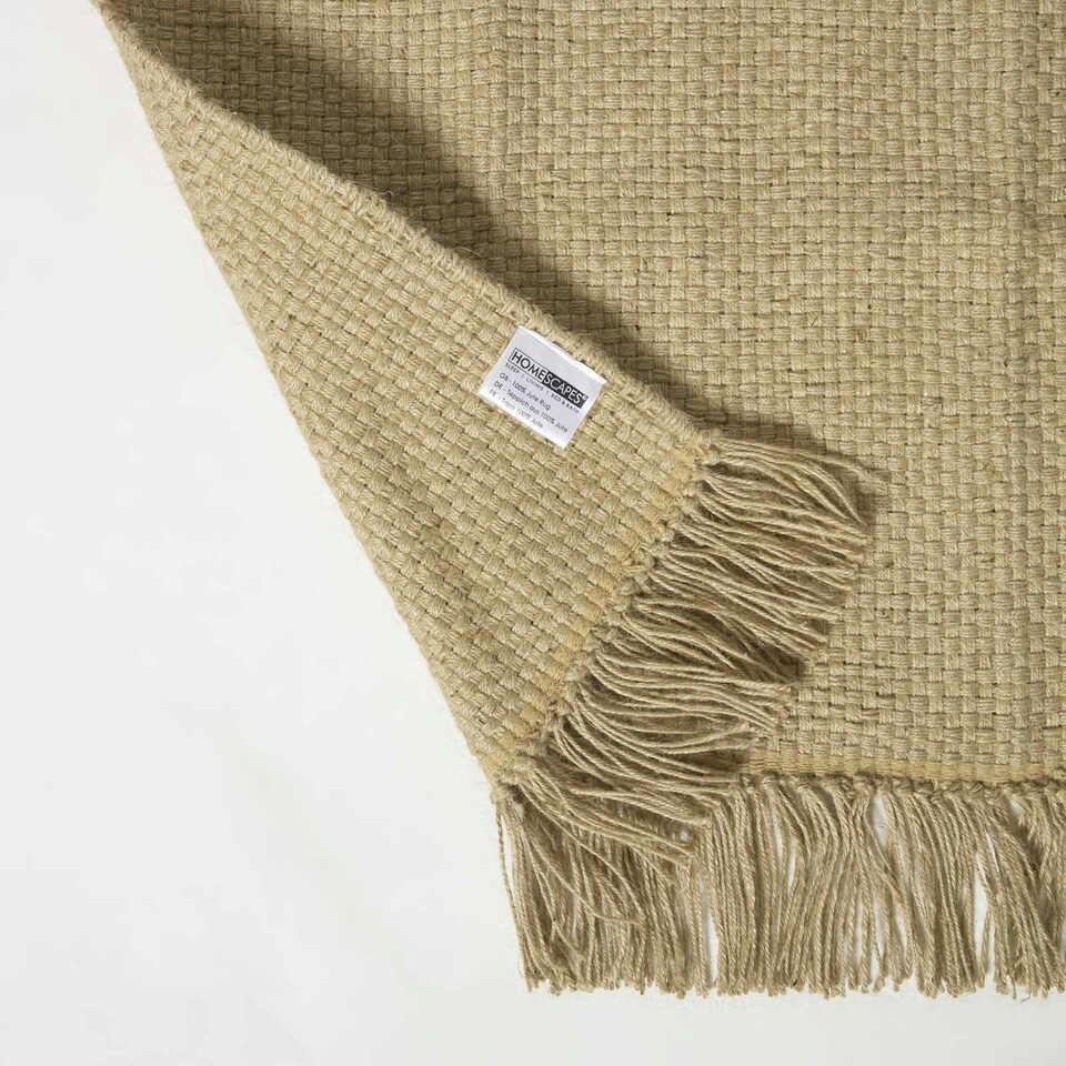 image 1 of Homescapes Zaphyr Natural Handwoven Jute Rug with Tassels - 70 x 120 cm | Cream | Natural