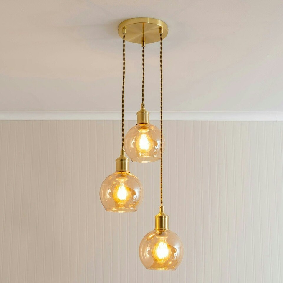 image 1 of ValueLights Bellamy Amber Glass Globe 3 Drop Cluster Gold Ceiling Pendant Light with Bulbs Gold