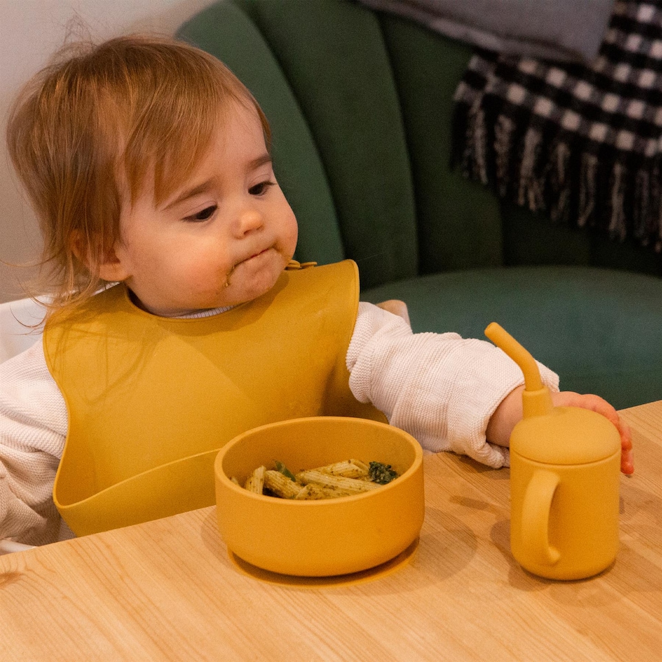 image 1 of Tiny Dining Silicone Suction Bowl & Spoon Set - Ochre - Non-Slip Silicone Baby Toddler Weaning Bowl Feeding Set | Yellow | Ochre