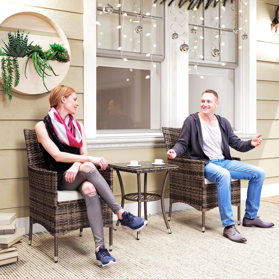 image 1 of Outsunny 3 Pieces Rattan Bistro Set, Wicker Garden Furniture Set with 2 Tier Coffee Table and Chairs, Cushions, for Outdoor Patio Balcony, Brown