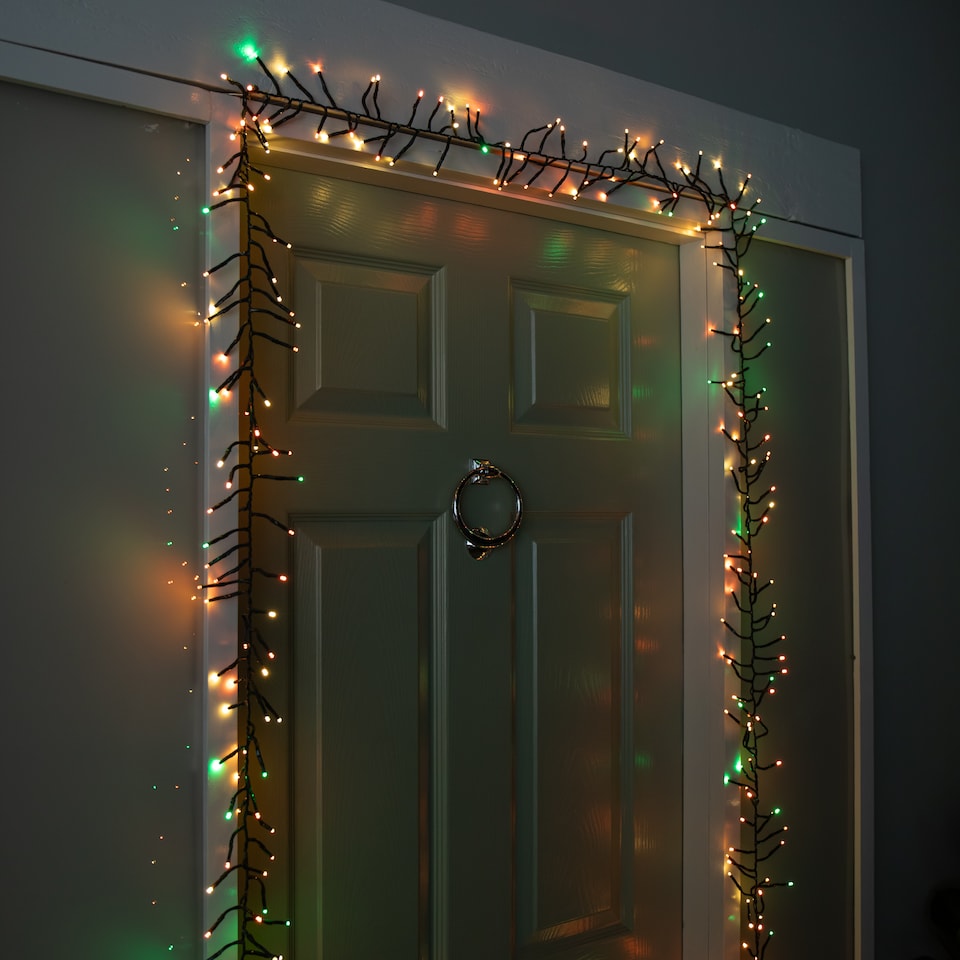 image 1 of 5.5m 426 Cluster LED Autumn Twist Door Garland with Multi-Coloured LEDs on Green Cable
