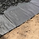 image 6 of Harbour Housewares 110gsm Weed Control Membrane - 2m x 5m (1 Roll) - Weed Fabric Garden Membrane Weed Membrane Flower Bed Membrane Black