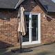 image 3 of Outdoor 4 Person Round Glass Top Garden Dining Table Chairs With Beige Banana Parasol and Base