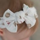 image 3 of Ziggle Baby Top Bow Turban Headband - Hedgehog | White | 1