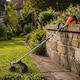 image 4 of Yard Force 40V (2x20V) Cordless 2-in-1 Brush Cutter With Steel Blade & Line Head | Orange