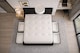 image 3 of Divan Bed Set Headboard and Footboard with Mattress 4ft6 Double Black Suede Storage 2 Drawers Left Side Laying in Bed