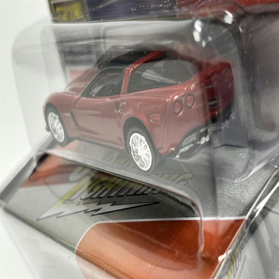 image 1 of 2012 Chevy Corvette Z06 with Tin Inferno Orange 1:64 Scale Johnny Lightning JLCT009B